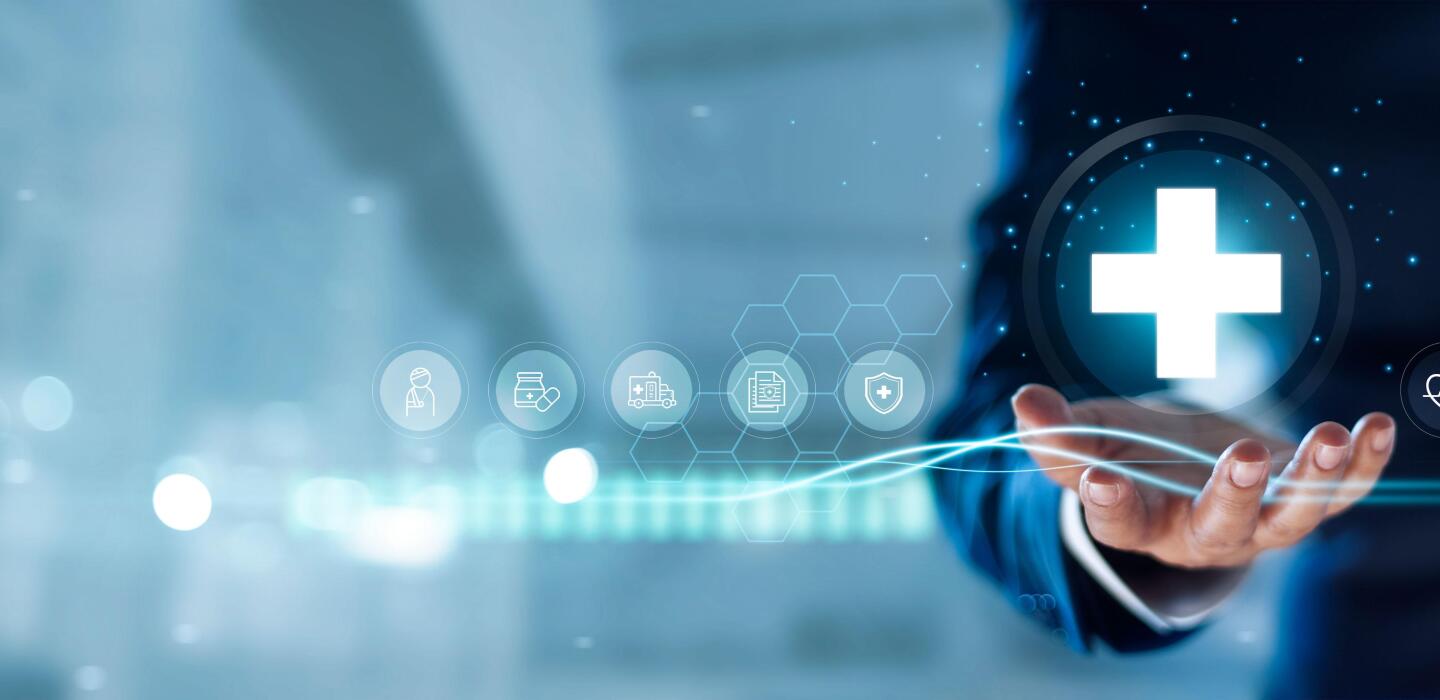 Businessman hold virtual medical network connection icons. Covid-19 pandemic develop people awareness and spread attention on their healthcare, rising growth in hospital and health insurance business.