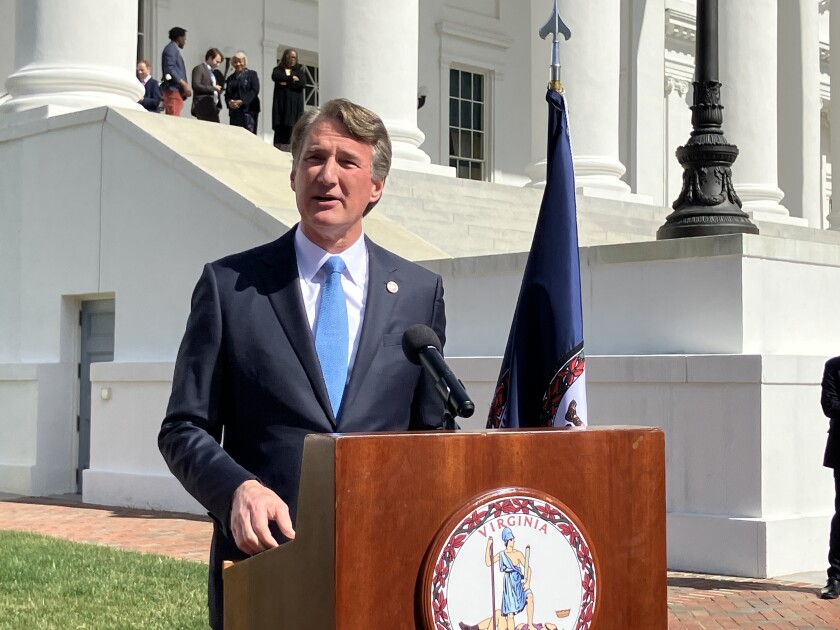 Gov. Glenn Youngkin delivered remarks about the legislature's state budget proposal from the Virginia State Capitol, Thursday, March 7, 2024, while Sen. Louise Lucas, D-Portsmouth, looked on from above. (Katie King/The Virginian-Pilot/TNS)