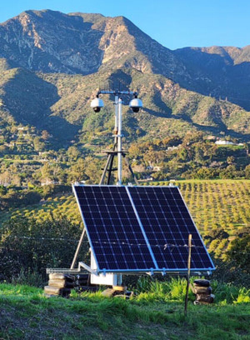 AI wildfire tech with a solar panel