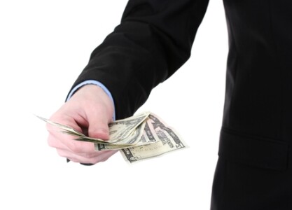 shutterstock_holding_money