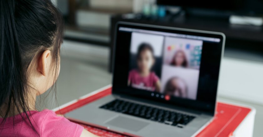 young girl attends online elearning class 