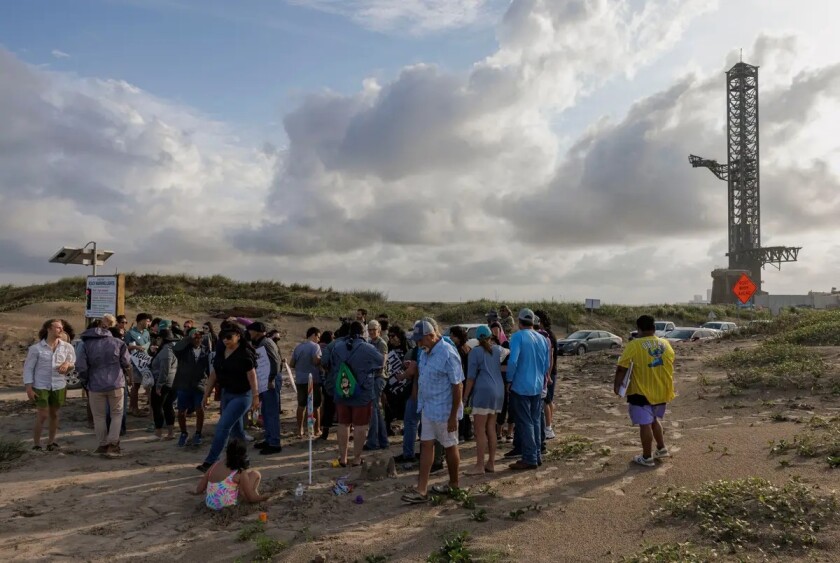 A rally at Boca Chica Beach against the incorporation of Starbase on May 3. Credit: Michael Gonzalez for KUT News