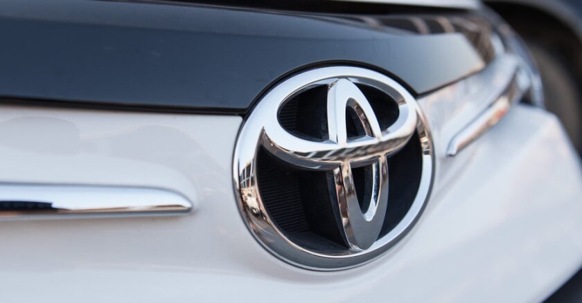 The Toyota logo on a car.
