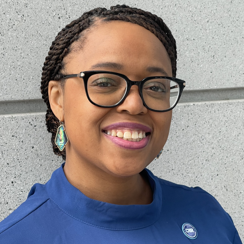 Headshot of Lisa Jammer, people and culture officer for DIR, wearing blue blouse.